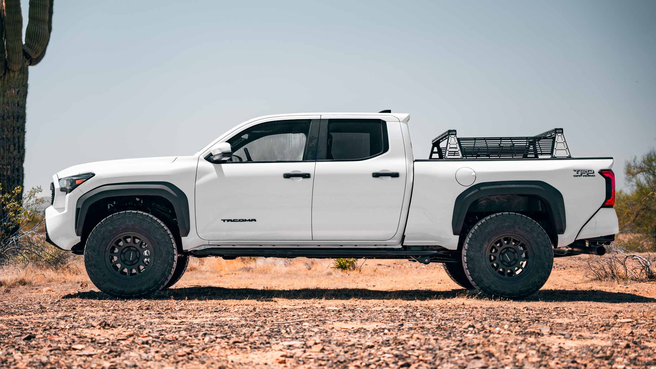 2024 (4th Gen) Toyota Tacoma Long Bed Off-road & Overland Modifications by Westcott Designs. Profile view.